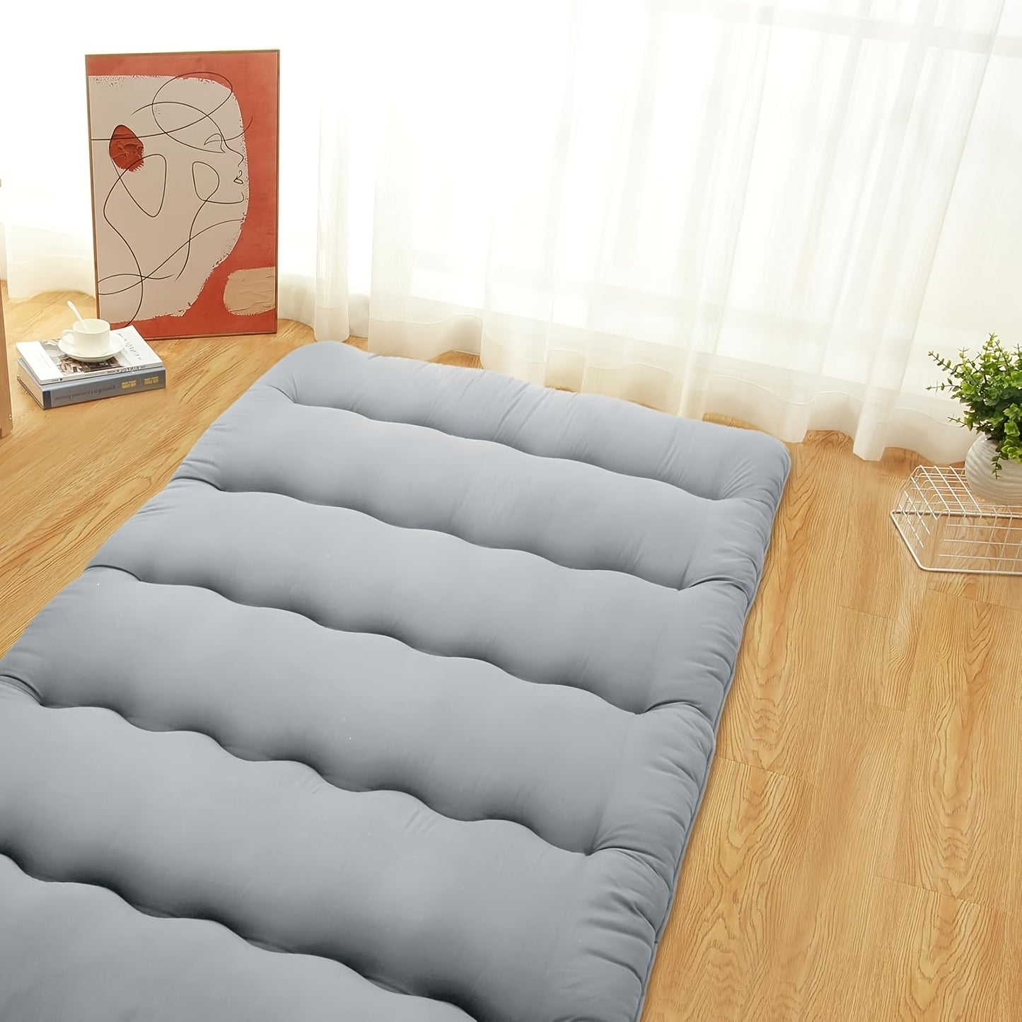 Grijze opvouwbare Japanse futonmatras – Comfort en veelzijdigheid met minimalistische stijl